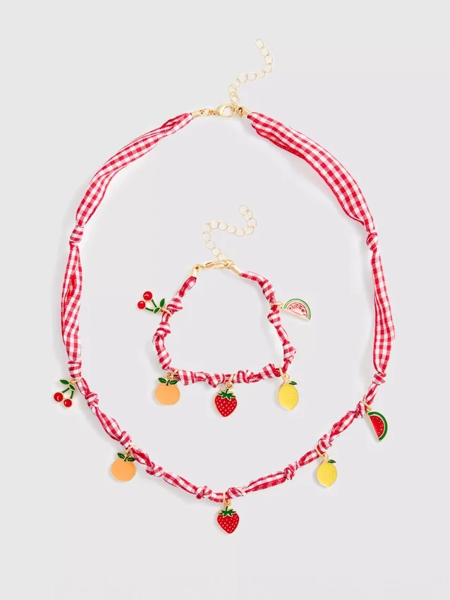 Conjunto de joias com pingentes de frutas