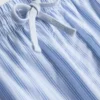 Conjunto de pijama de manga comprida às riscas