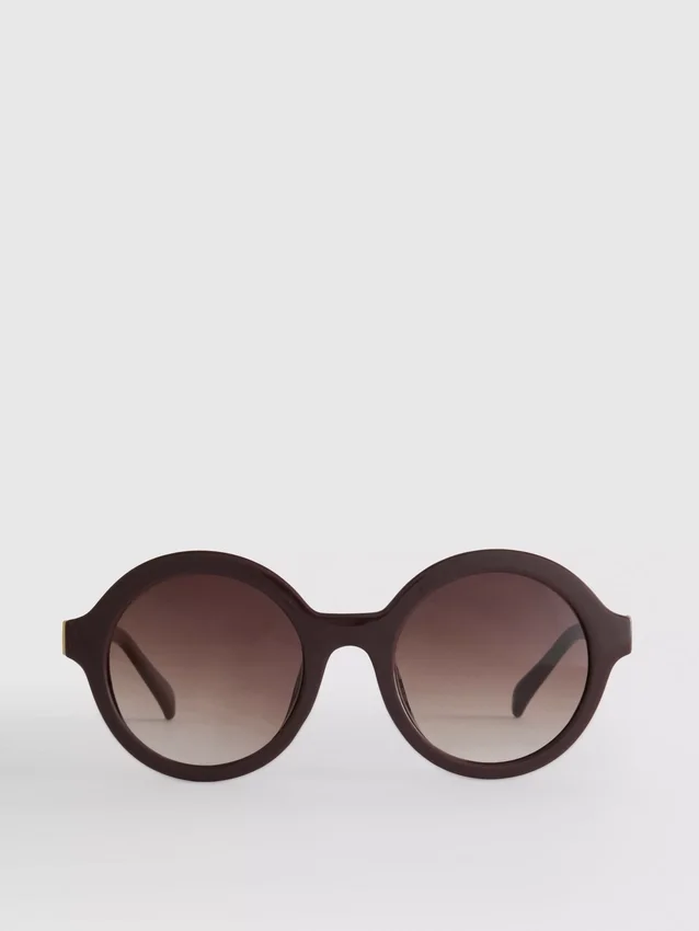 Óculos de sol redondos com lentes coloridas