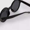 Óculos de sol redondos com lentes coloridas