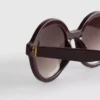 Óculos de sol redondos com lentes coloridas