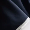 Fato de treino com decote redondo em contraste