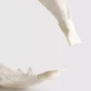 Fita para o cabelo com nó floral