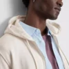 Hoodie essencial com fecho de correr