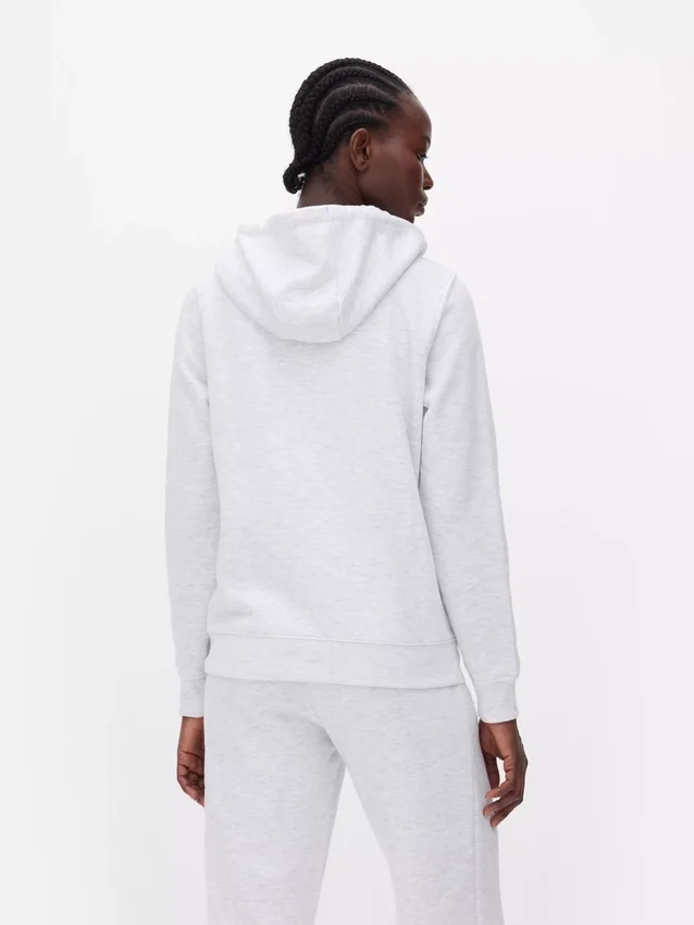 Hoodie essencial com fecho de correr