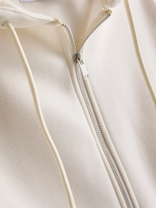 Hoodie essencial com fecho de correr