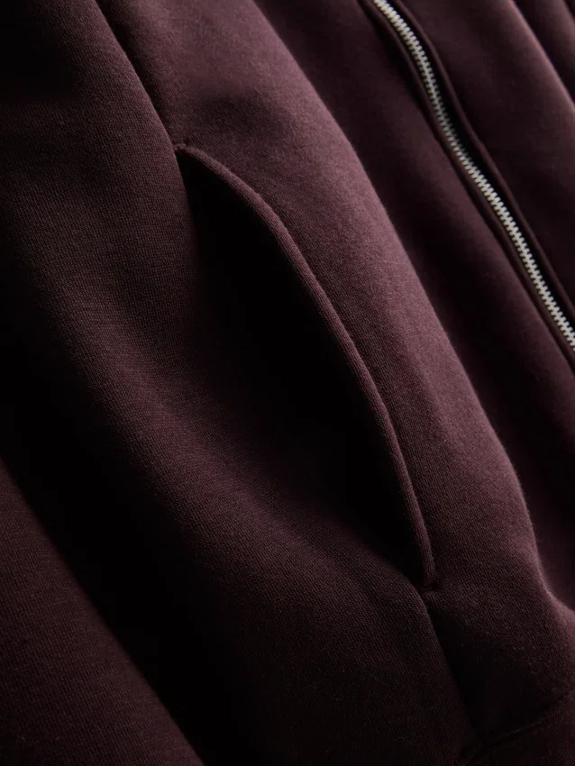 Hoodie essencial com fecho de correr