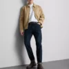 Jeans de cintura média e corte justo