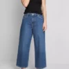 Jeans de ganga curtos de perna larga