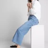 Jeans de ganga curtos de perna larga