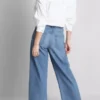 Jeans de ganga curtos de perna larga