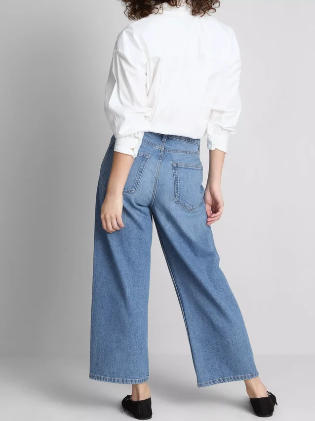 Jeans de ganga curtos de perna larga