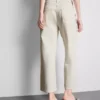 Jeans de ganga curtos de perna larga