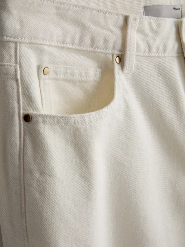 Jeans de ganga curtos de perna larga