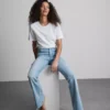 Jeans de ganga de algodão, cintura média e perna larga