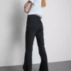 Jeans de ganga de algodão, cintura média e perna larga