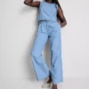 Jeans de ganga de algodão com pregas e perna larga