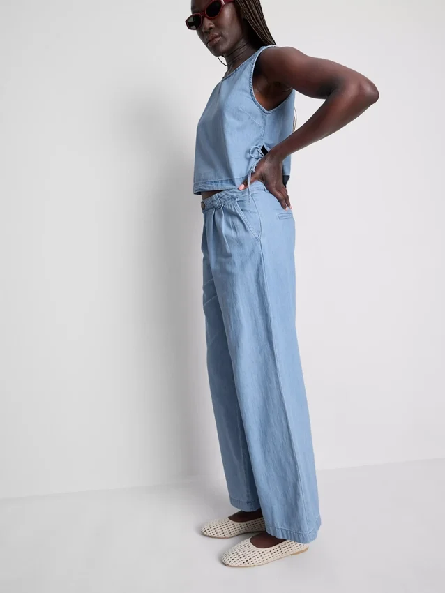 Jeans de ganga de algodão com pregas e perna larga