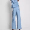 Jeans de ganga de algodão com pregas e perna larga