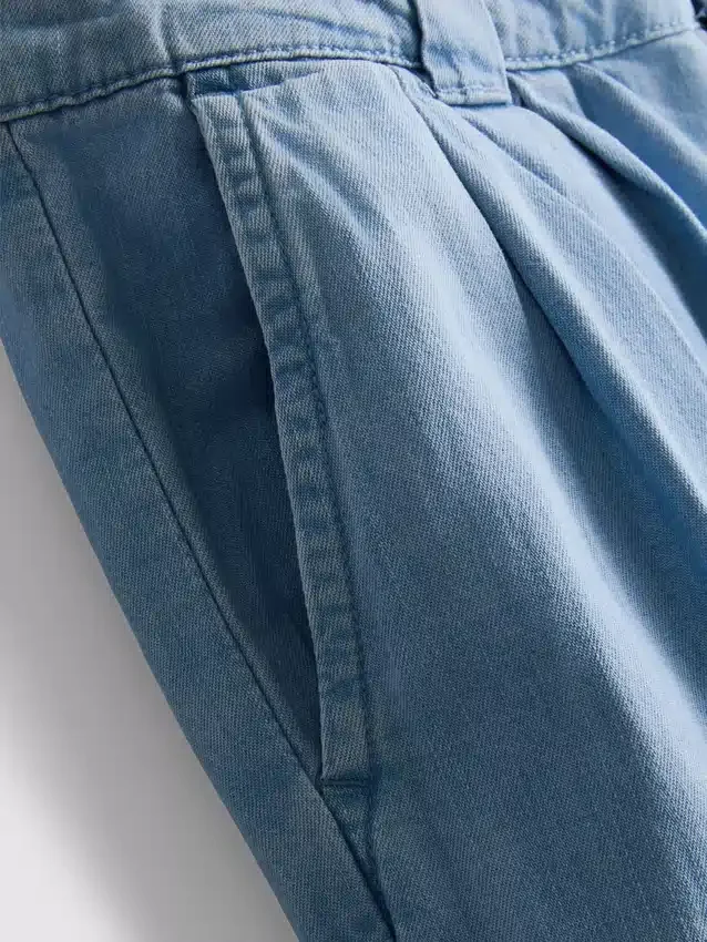 Jeans de ganga de algodão com pregas e perna larga