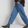 Jeans de ganga de algodão de cintura alta e corte afunilado