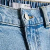 Jeans de ganga de algodão de cintura alta e corte afunilado