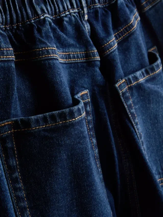 Jeans de ganga de algodão de cintura alta e corte afunilado