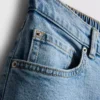 Jeans de ganga de algodão de cintura alta e corte afunilado