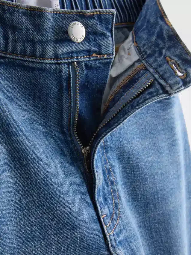 Jeans de ganga de algodão de cintura alta e corte afunilado