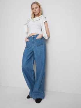 Jeans de perna larga com bolsos à frente