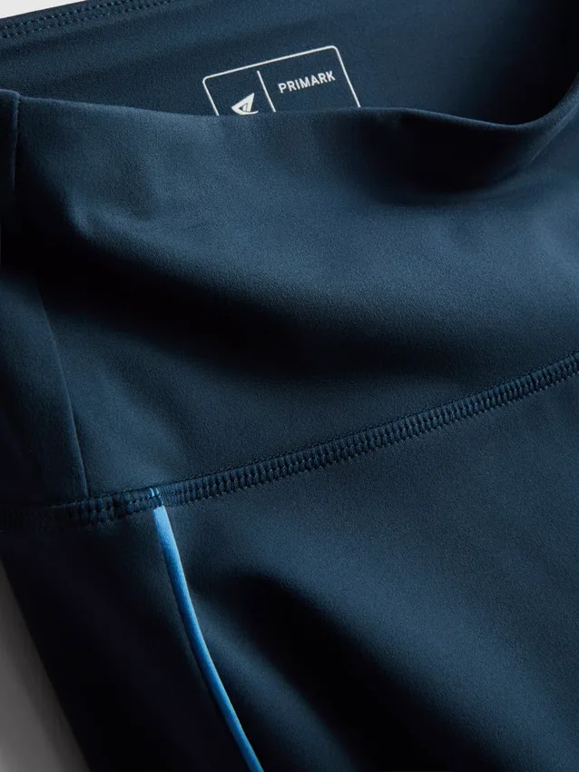 Leggings desportivas com apoio suave e detalhes em forma de tubo