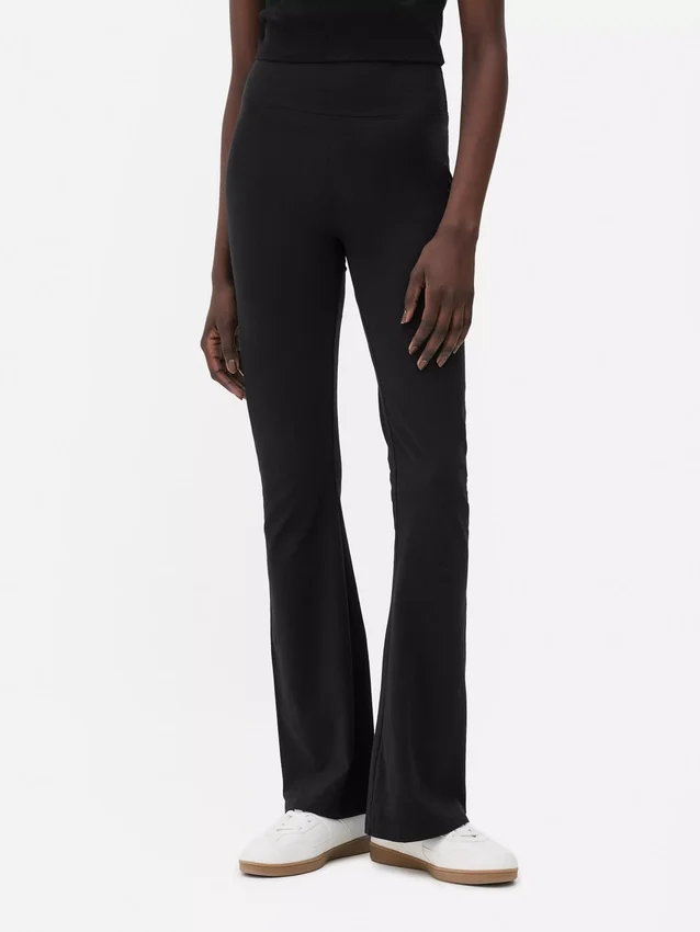 Leggings desportivas de cintura alta e corte largo