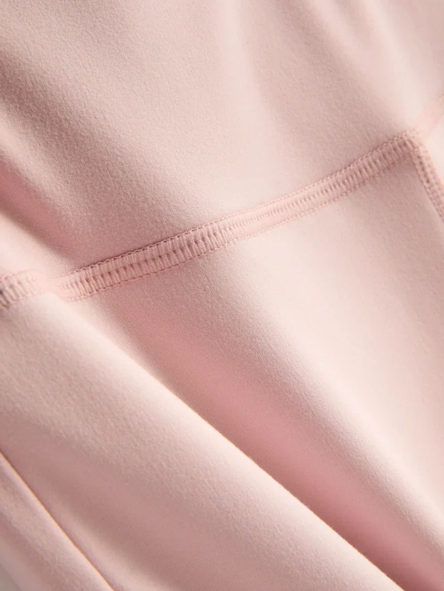 Leggings desportivas de cintura alta e corte largo