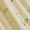 Macacão de dormir com canelado e estampado floral