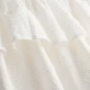 Mini-saia em camadas de algodão com bordados