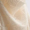 Mini-vestido com decote em capuz, em croché e com alças