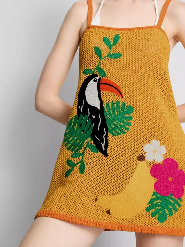 Mini-vestido de praia em croché bordado