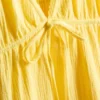 Mini-vestido em algodão com decote em V e camadas