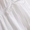 Mini-vestido em algodão com decote em V e camadas