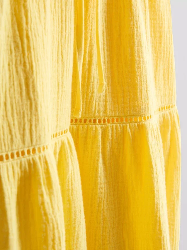 Mini-vestido em algodão com decote em V e camadas