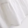 Mini-vestido em algodão com decote em V e camadas