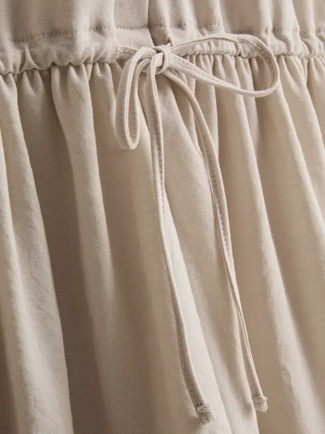 Mini-vestido em camadas de manga curta
