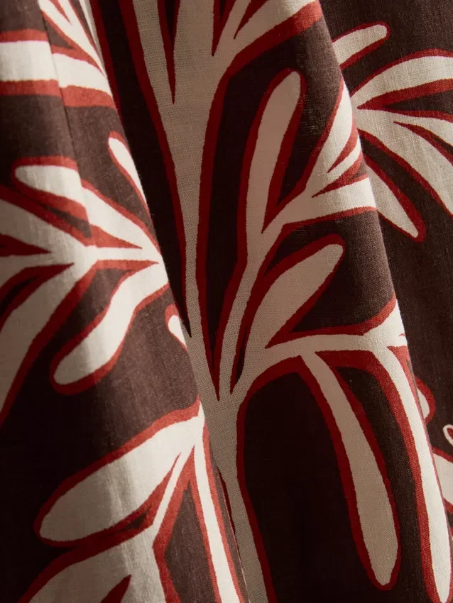 O vestido midi com decote halter estampado em mistura de linho da The Edit