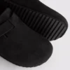 Pantufas tipo mule com biqueira fechada
