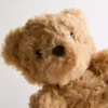 Pequeno brinquedo de peluche em forma de ursinho