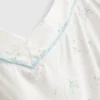 Pijamas com camisola de alças e laço em cetim estampado