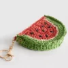 Porta-moedas com motivos de frutas