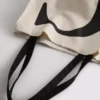 Saco de compras com inicial