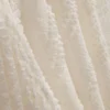 Saia de renda com bainha assimétrica