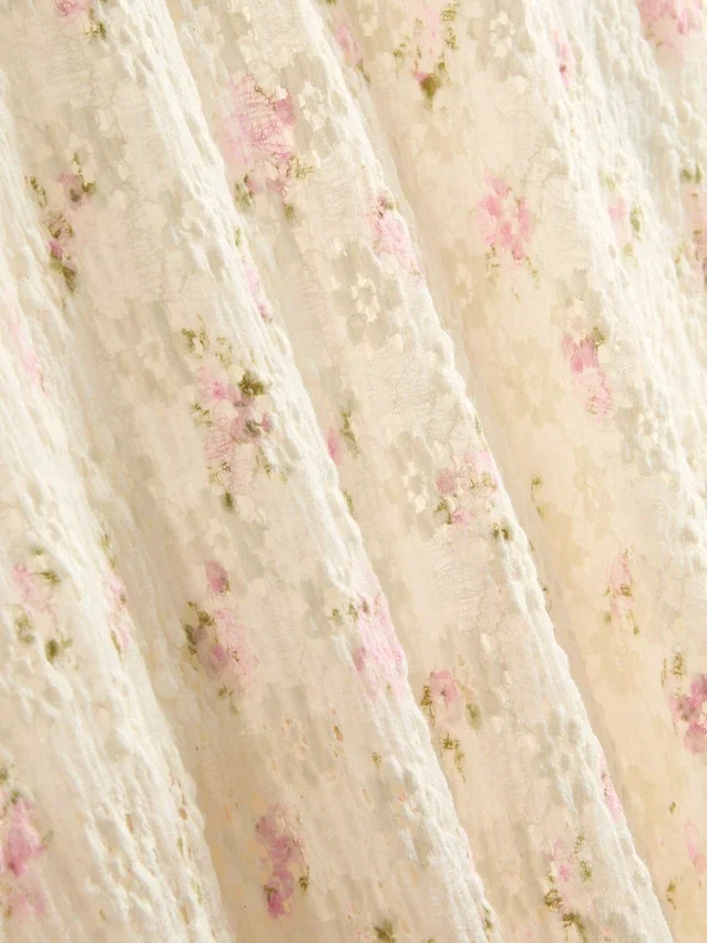 Saias midi florais texturadas em mistura de algodão